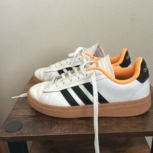White and yellow Adidas, size 7.5 women’s